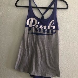 Pink size medium tank top colors blue,gray, white says pink tied back